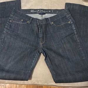 Wide legged & Low waisted with a bit of stretch.